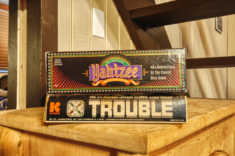 Kissing the Clouds board games Trouble and Yahtzee